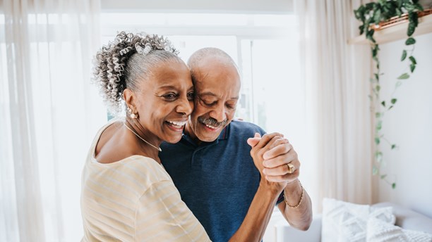 Senior Couple Dancing Together