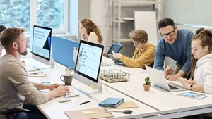 Group of people on computers