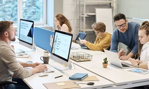 Group of people on computers