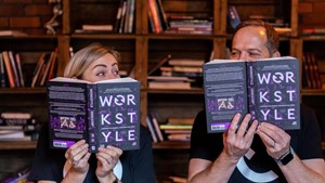 16.9 Lizzie and Alex with books